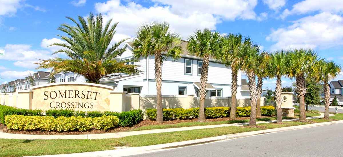Florida townhome community with palm trees