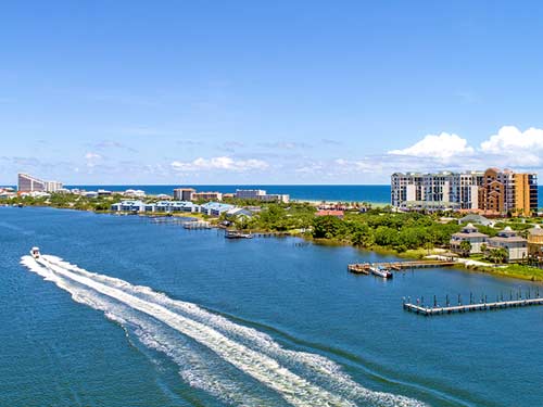 boat waves along perdido key florida
