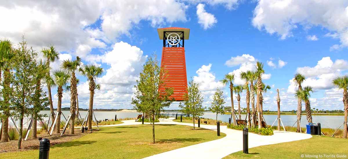 Florida community park with walking trail and palm trees