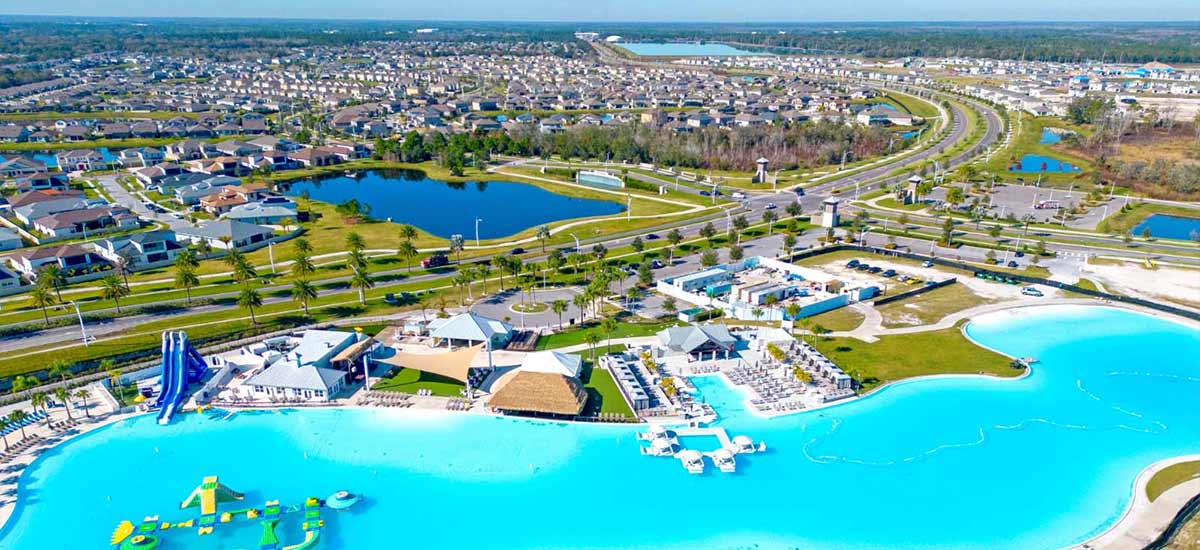 aerial viel of large lagoon pool and florida homes